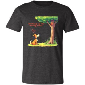 A black T-shirt features a cartoon dog with red question marks, staring at a tree with a squirrel on a branch. Red text above reads “Barking up the wrong tree…” Yellow text below says, That’s a squirrel! Green grass surrounds the trees base.