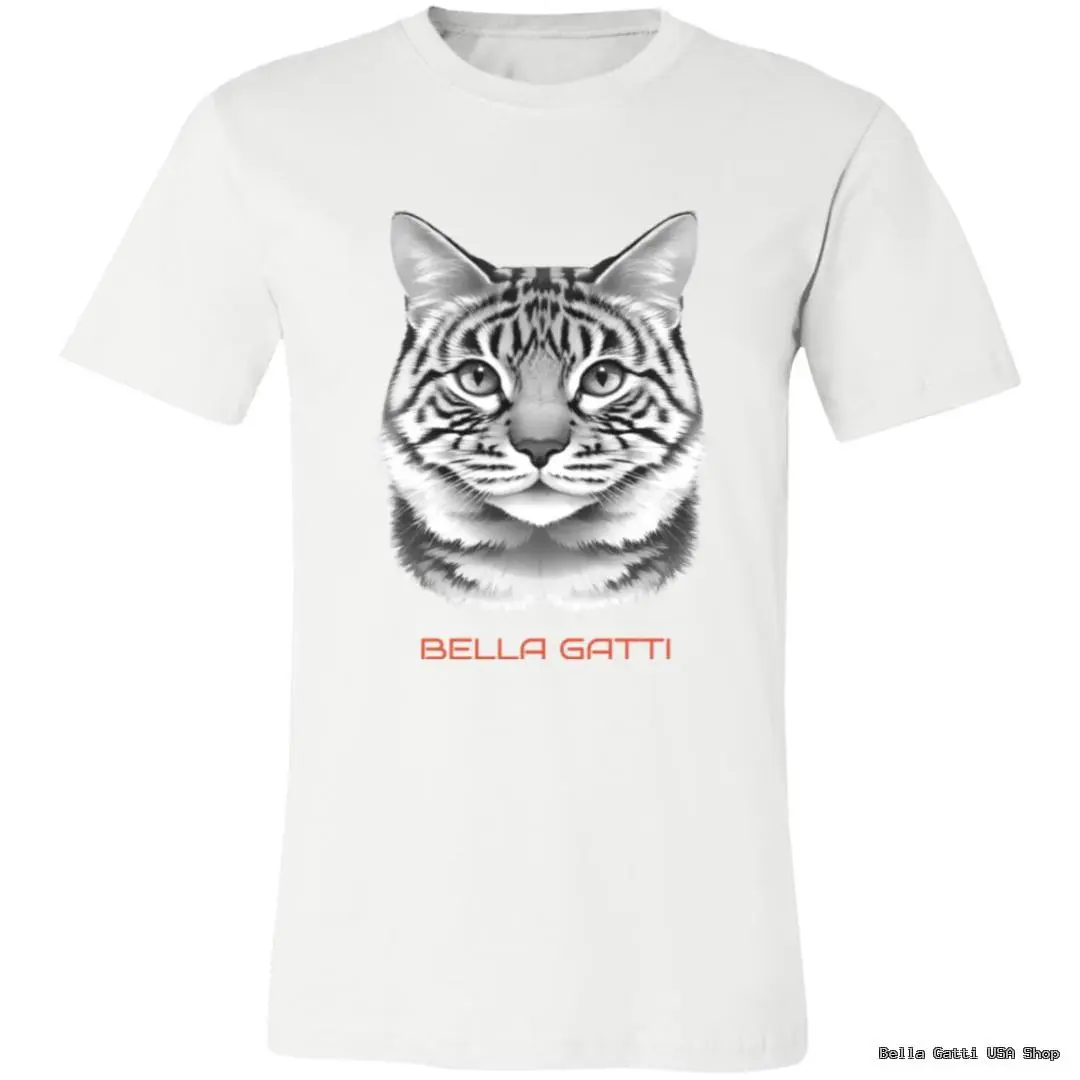 A white T-shirt features a detailed, realistic black-and-gray cat face illustration centered on the chest. Below the cat’s face, the words “BELLA GATTI” are written in bold, orange capital letters.