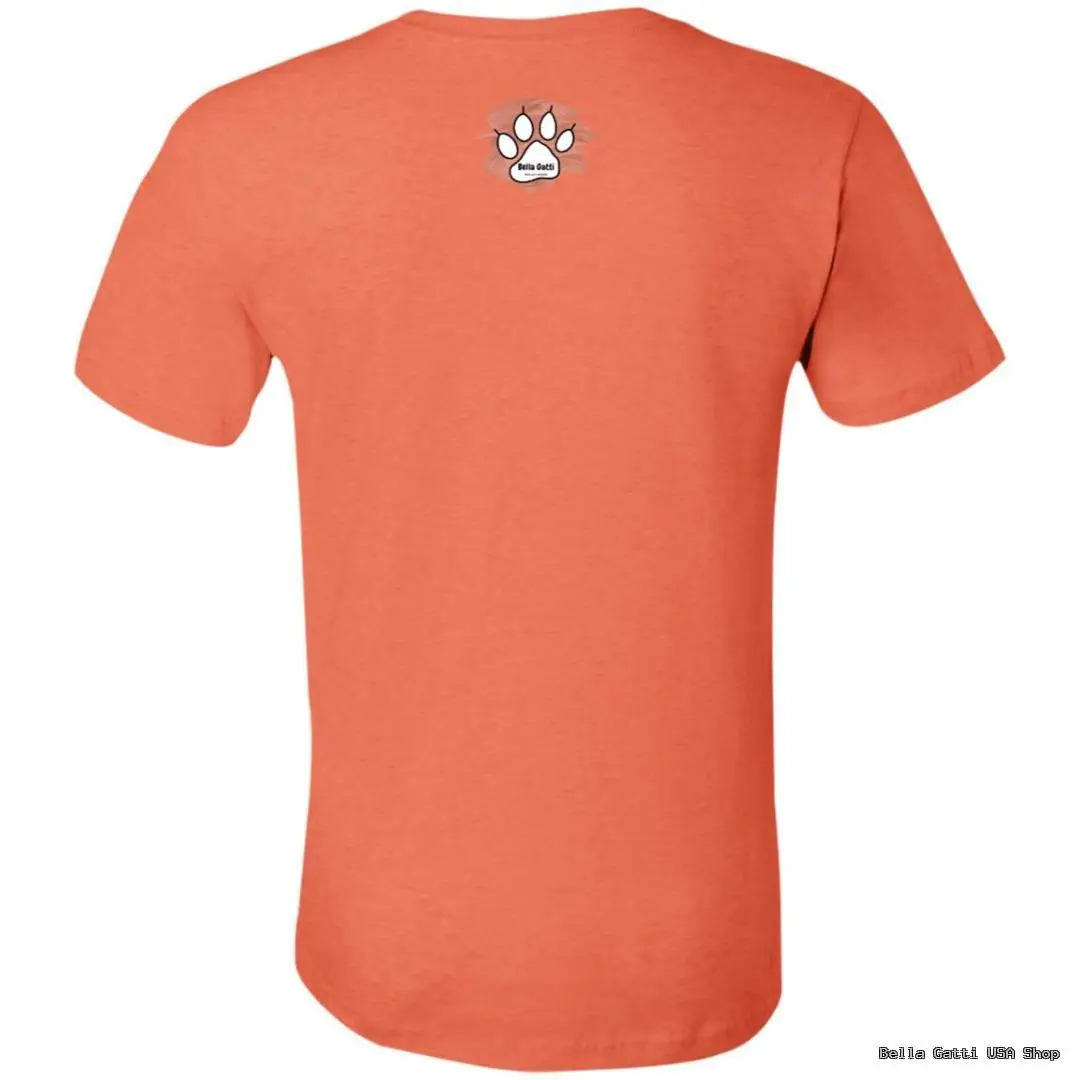 An orange short-sleeve t-shirt is shown from the back. Near the upper center, there is a small white paw print graphic with the word “badas” inside it. The shirt has a simple design and no other visible markings.