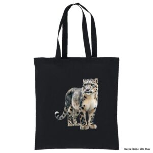 A black tote bag with long handles features a detailed illustration of a snow leopard standing and facing forward, showing its white and gray fur with dark spots and a thick, bushy tail. The rest of the bag is plain black.