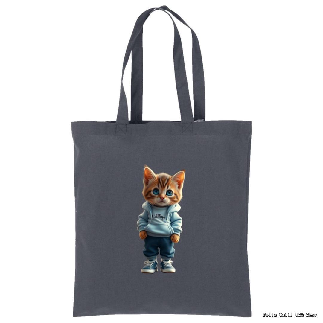 A gray tote bag features an illustration of an orange tabby kitten standing upright. The kitten is wearing a light blue hoodie, blue jeans, and sneakers, with its paws in its pockets, giving it a cool and casual appearance.